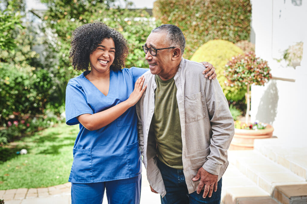 Shot of an attractive young nurse bonding with her senior patient outside
