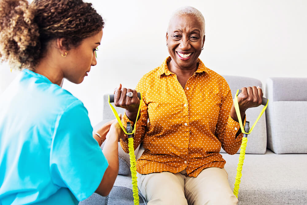 patient working with physical therapist