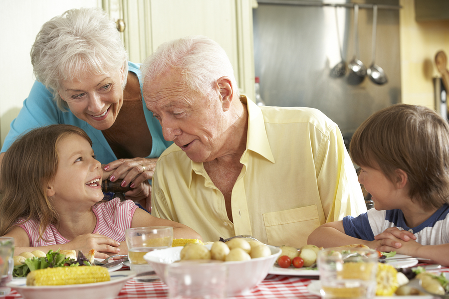 Image of grandparents and grandchildren eating