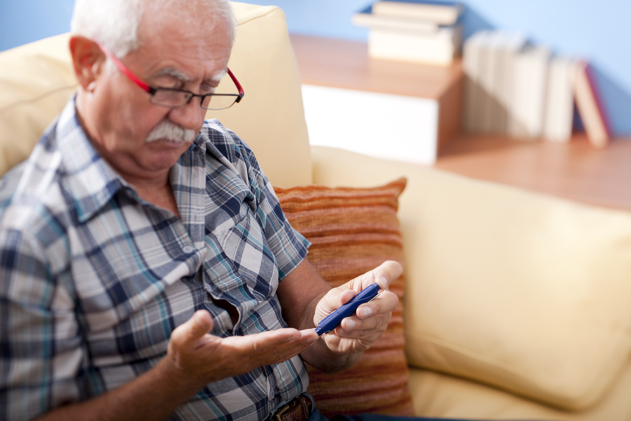 man taking insulin test