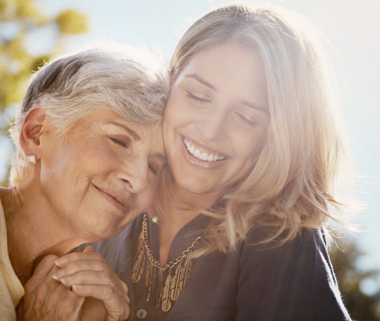 Shot of a happy senior woman spending quality time with her daughter outdoors