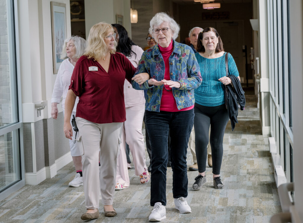 seniors walking down hallway